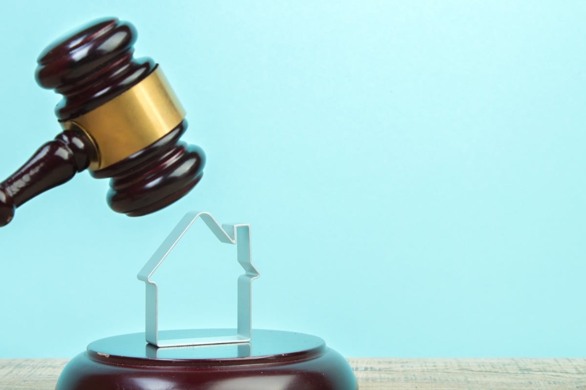 Judge gavel and a house figure