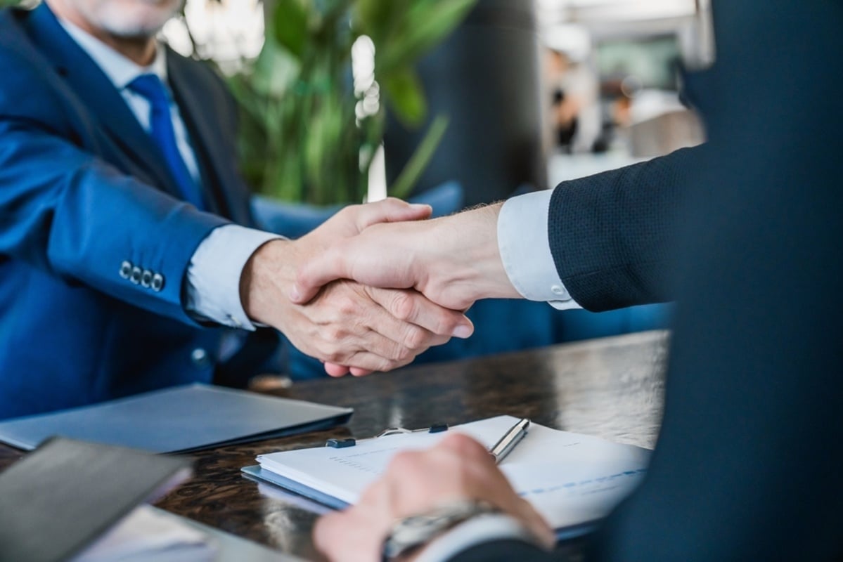 Two businessmen shaking hands